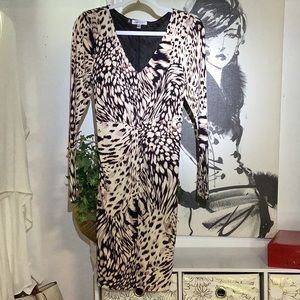 Jennifer Lopez leopard cocktail dress.